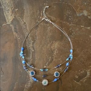 Multi Strand Floating Blue Beads On Wire Necklace